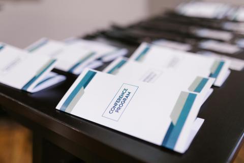 A close-up image of neatly folded printed documents, emphasizing professional folding services offered by our copy center for brochures, letters, and promotional materials.